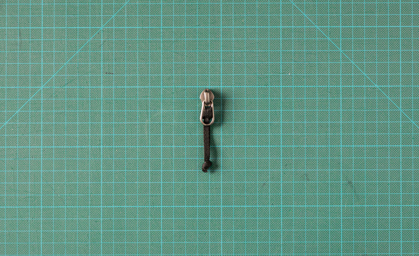 Slider for zipper. 